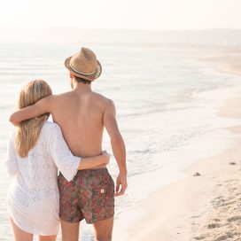 young-couple-in-love-on-a-white-beach-at-sunset-UXVFQRT.jpg